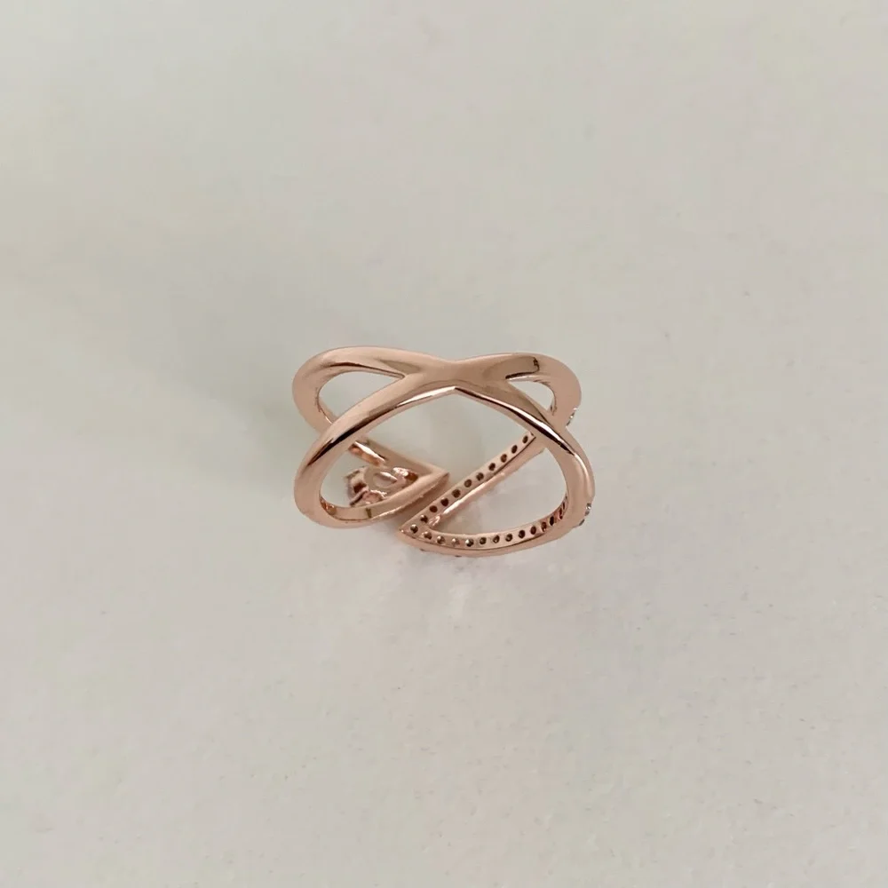 NWOT Rose gold X ring